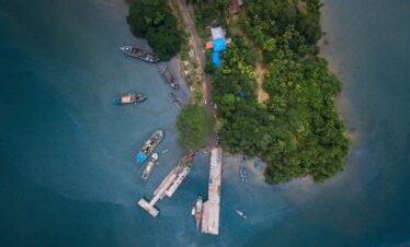 Andaman Islands tour — aerial view of turquoise lagoon and white sand beach at Radhanagar, Havelock Island