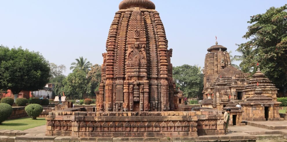 Odisha tour package — Konark Sun Temple chariot wheels at golden hour