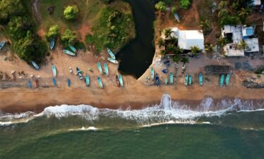 Pondicherry Mahabalipuram tour — Shore Temple standing at Bay of Bengal coast at golden sunrise Mahabalipuram