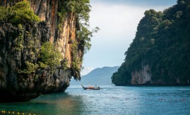 Andaman tour package aerial view of turquoise lagoon and white sand beach Havelock Island